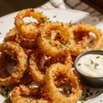 Crispy Keto Parmesan Onion Rings Recipe You’ll Love 7 Keto parmesan onion rings recipe with garlic aioli on a plate